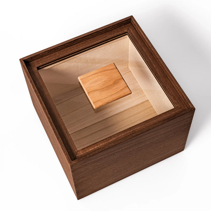 Dark brown paulownia wood rice container with airtight lid, handcrafted in Japan to store up to 3 kg rice while keeping it fresh and dry.