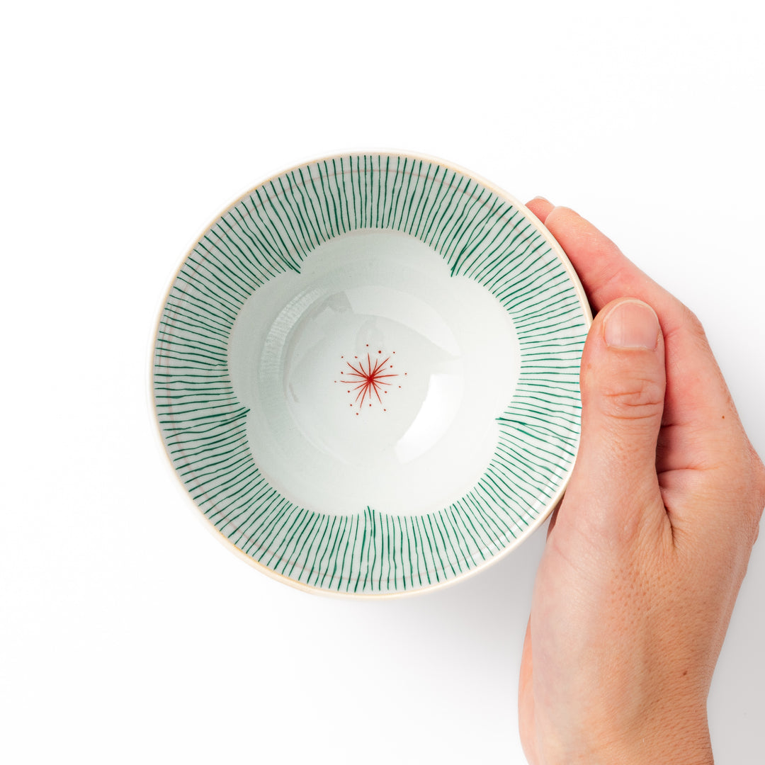 Japanese ceramic rice bowl with plum petal stripe design in green, blending modern elegance with traditional Japanese tableware