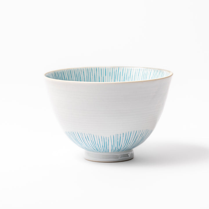 Japanese ceramic rice bowl with plum petal stripe design in blue, blending modern elegance with traditional Japanese tableware