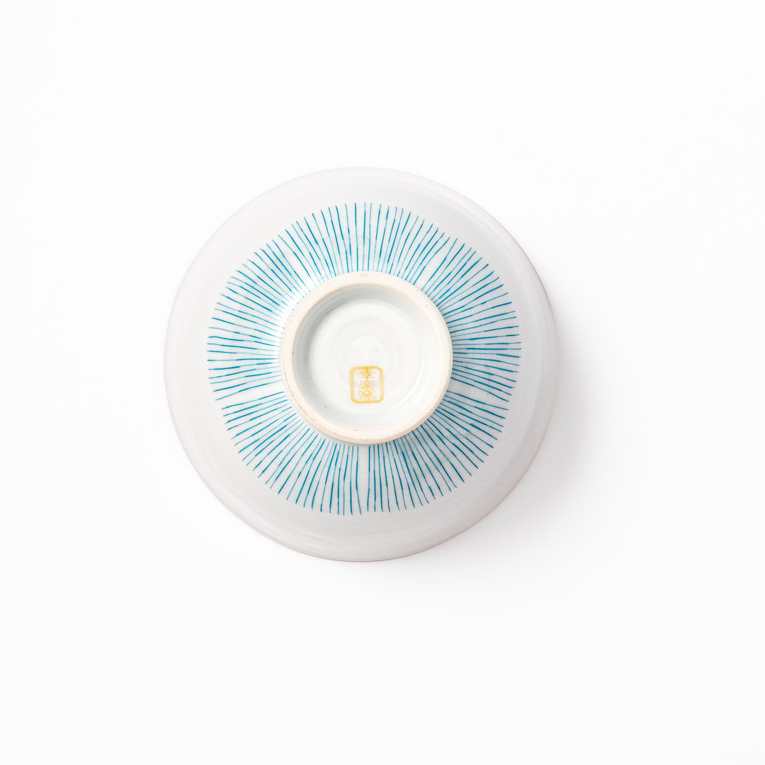 Japanese ceramic rice bowl with plum petal stripe design in blue, blending modern elegance with traditional Japanese tableware