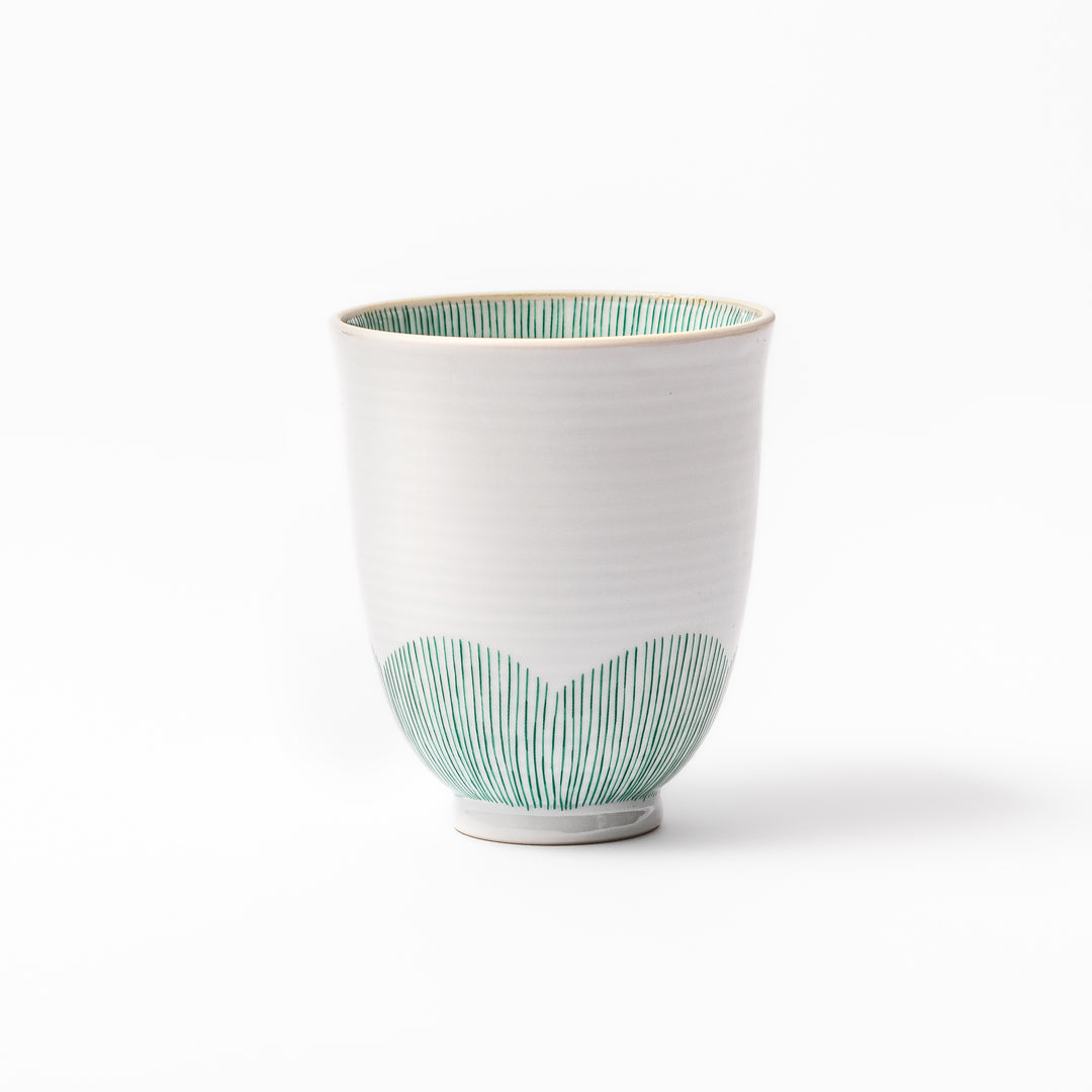 Japanese ceramic tea cup with plum petal stripe design in green, blending modern simplicity with traditional Japanese elegance