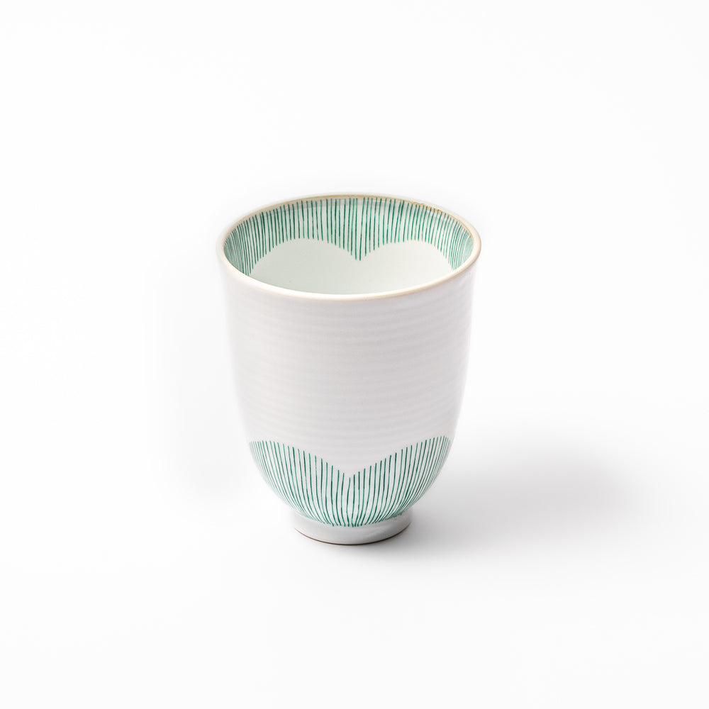 Japanese ceramic tea cup with plum petal stripe design in green, blending modern simplicity with traditional Japanese elegance