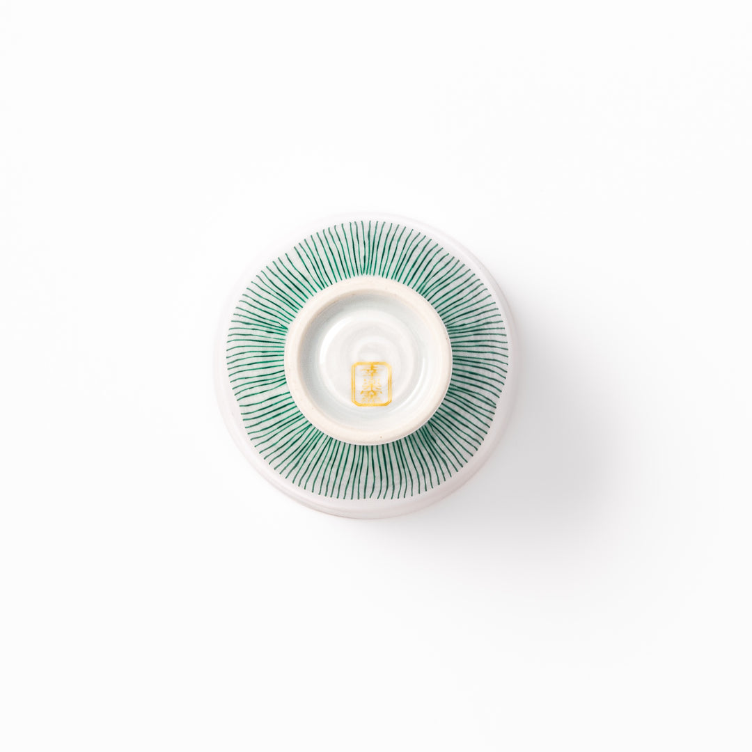 Japanese ceramic tea cup with plum petal stripe design in green, blending modern simplicity with traditional Japanese elegance