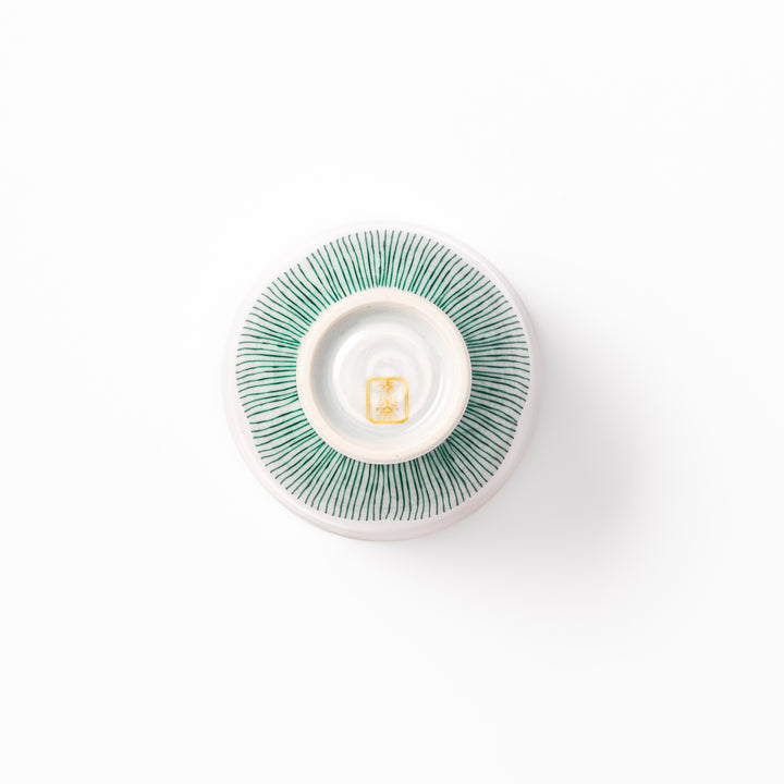 Japanese ceramic tea cup with plum petal stripe design in green, blending modern simplicity with traditional Japanese elegance
