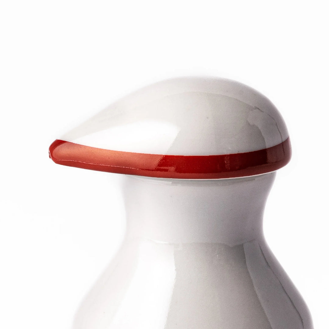 Japanese porcelain soy sauce dispenser with red floral pattern featuring plum and chrysanthemum blossoms, handcrafted design.