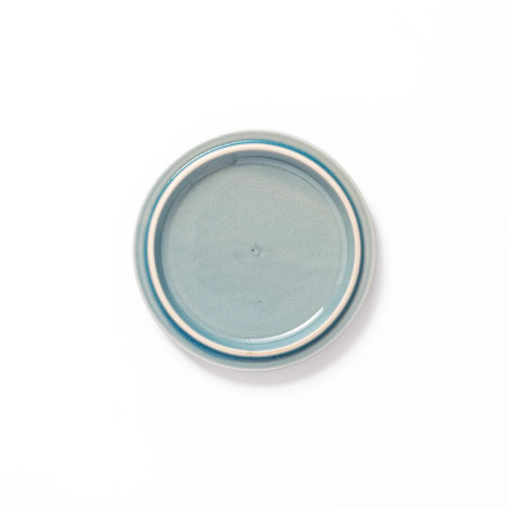 Light blue porcelain lid with embossed Seigaiha wave pattern, crafted to match stackable Japanese bowls beautifully.