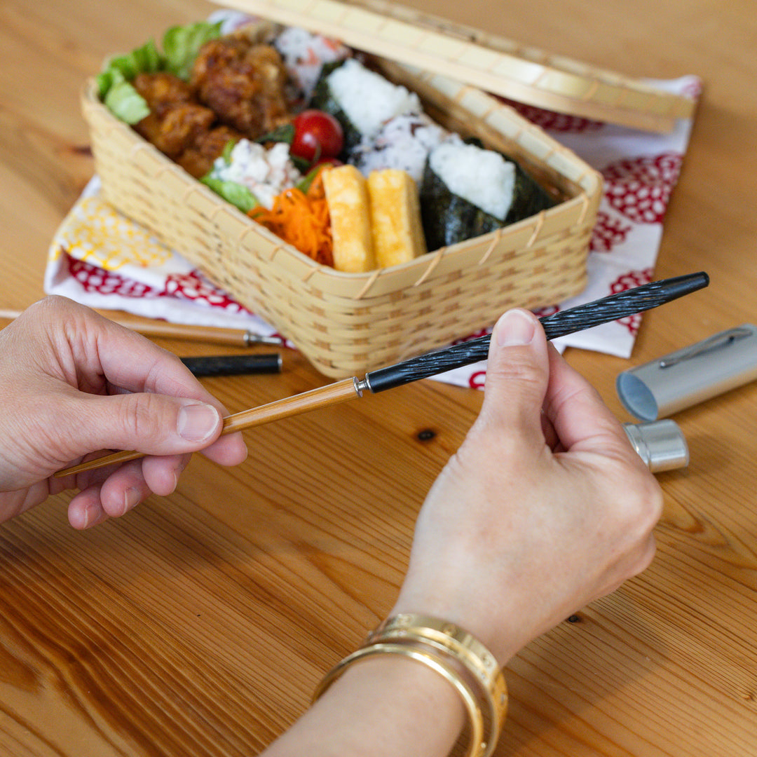 Nami from Just One Cookbook assembling portable Japanese travel chopsticks with a chiseled screw on textured handle