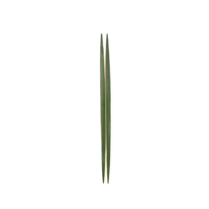 A pair of precision Japanese bamboo cooking chopsticks featuring slim green handles and ultra fine tapered tips for delicate plating