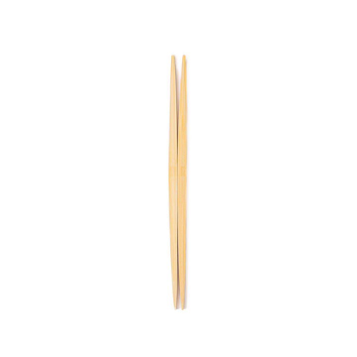 A pair of precision Japanese bamboo cooking chopsticks featuring slim green handles and ultra fine tapered tips for delicate plating