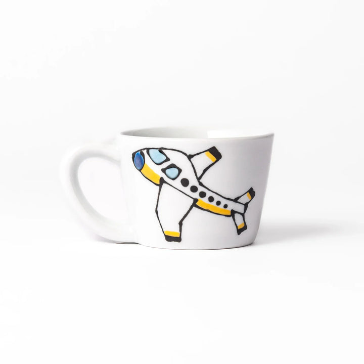 White ceramic kids mug featuring red fire truck with ladder graphic, round handle, shown on white background