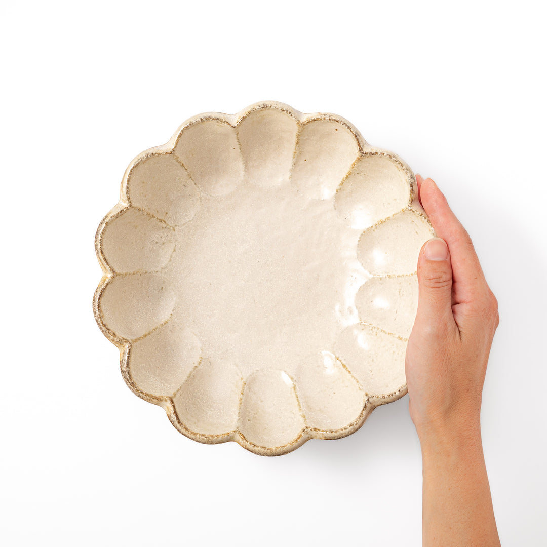 Japanese Rinka ceramic petal pasta bowl in off white, featuring a flower shaped rim and shallow depth for noodles