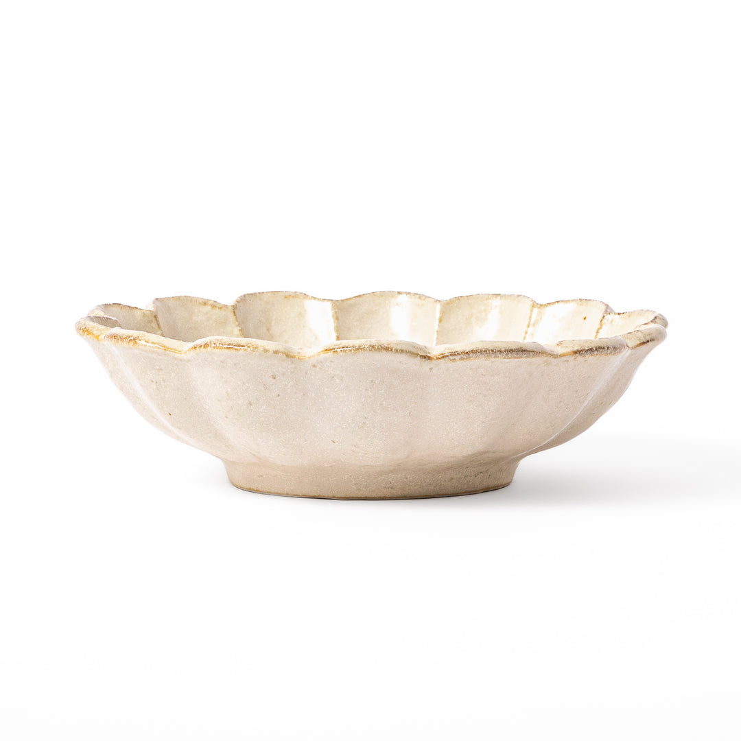 Japanese Rinka ceramic petal pasta bowl in off white, featuring a flower shaped rim and shallow depth for noodles