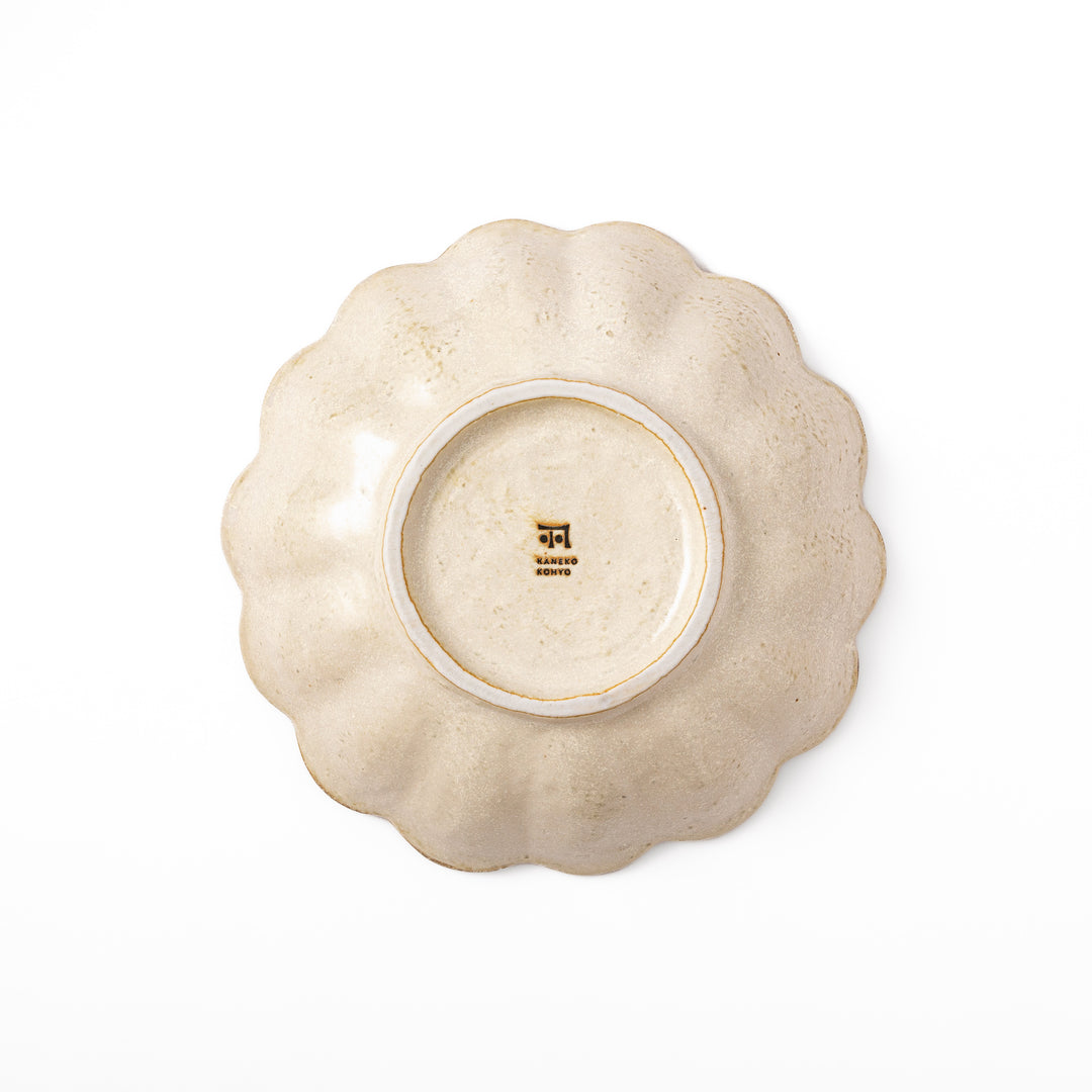 Japanese Rinka ceramic petal pasta bowl in off white, featuring a flower shaped rim and shallow depth for noodles