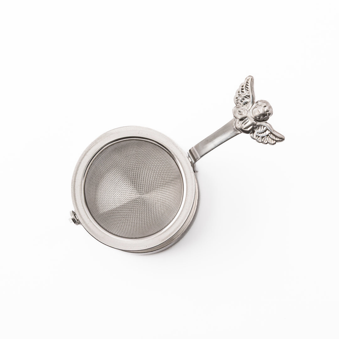 Elegant Japanese rotating angel tea strainer with stainless steel mesh basket and drip catcher base
