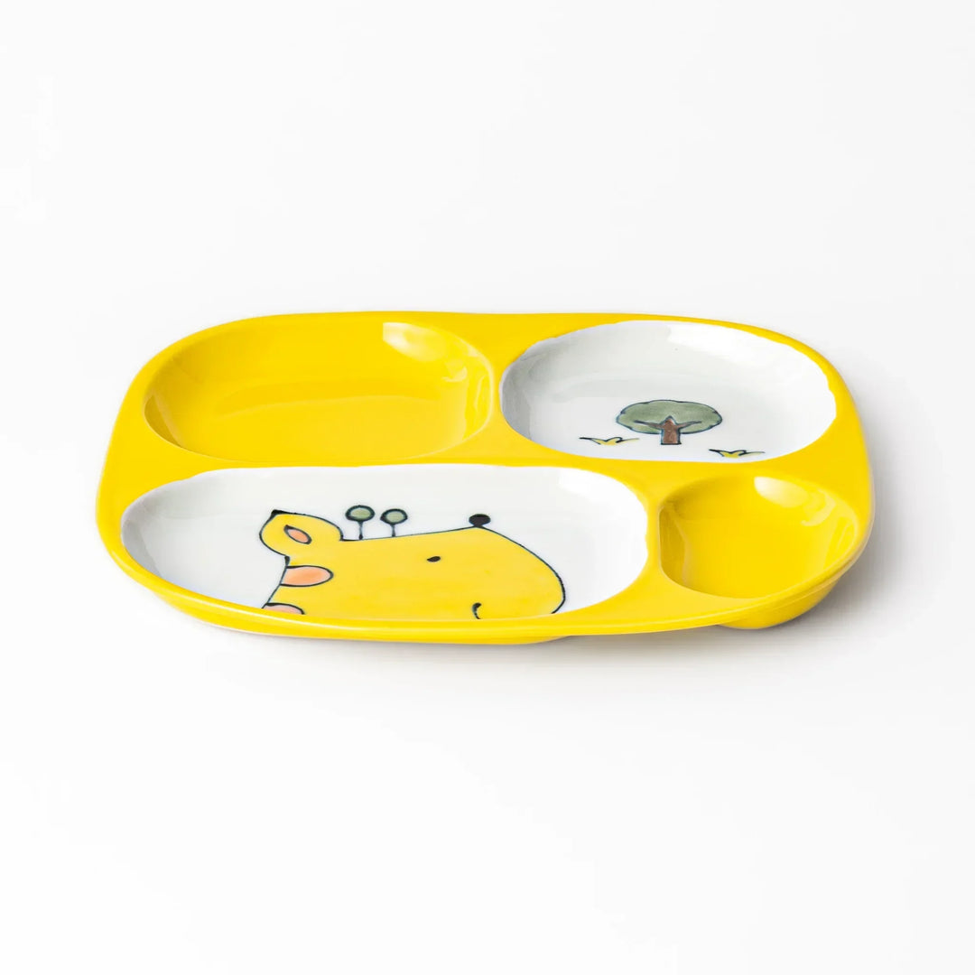 White ceramic kids divided plate with smiling yellow giraffe, tree and bird motifs, vibrant yellow sections