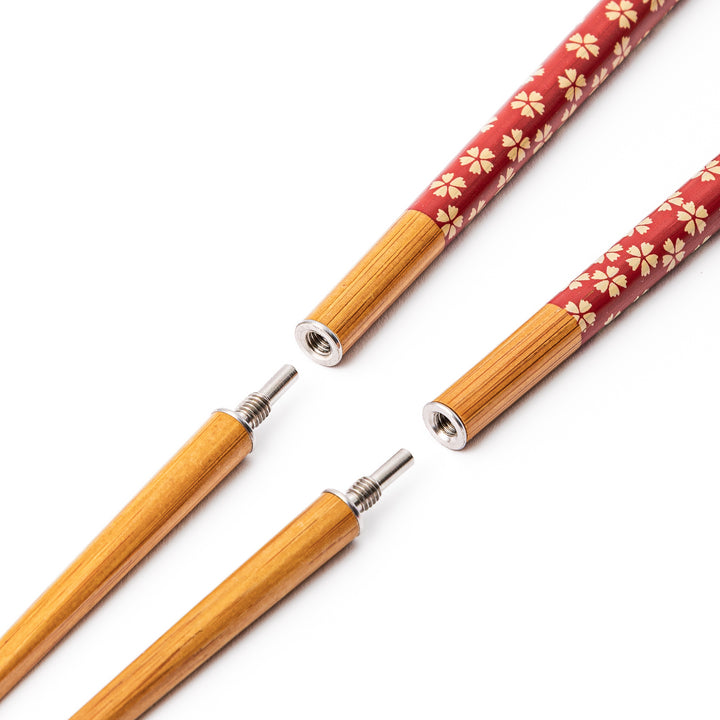 Sakura Japanese travel chopsticks detached into two pieces to show the screw in metal joints for compact storage