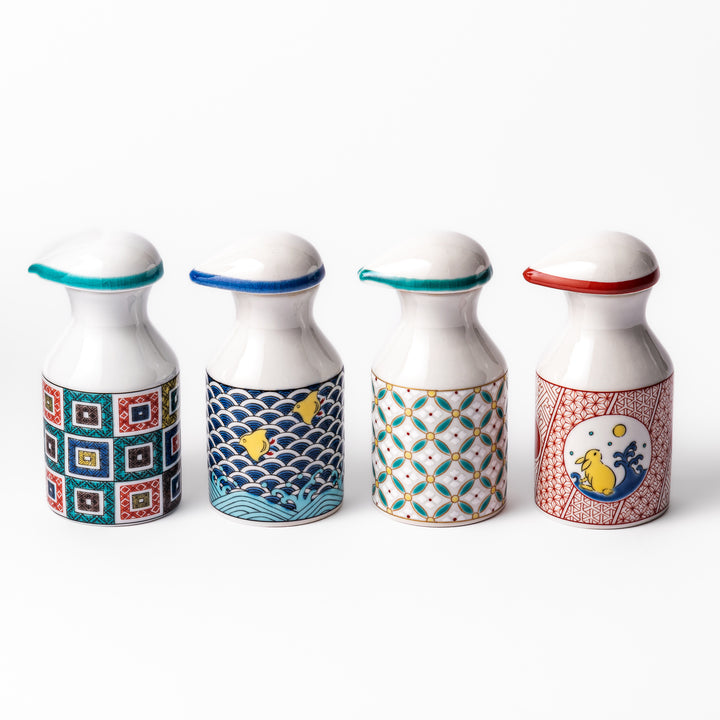 Set of Japanese ceramic soy sauce dispensers with colorful patterns including waves, shorebirds, and geometric motifs, perfect for enhancing dining tables.