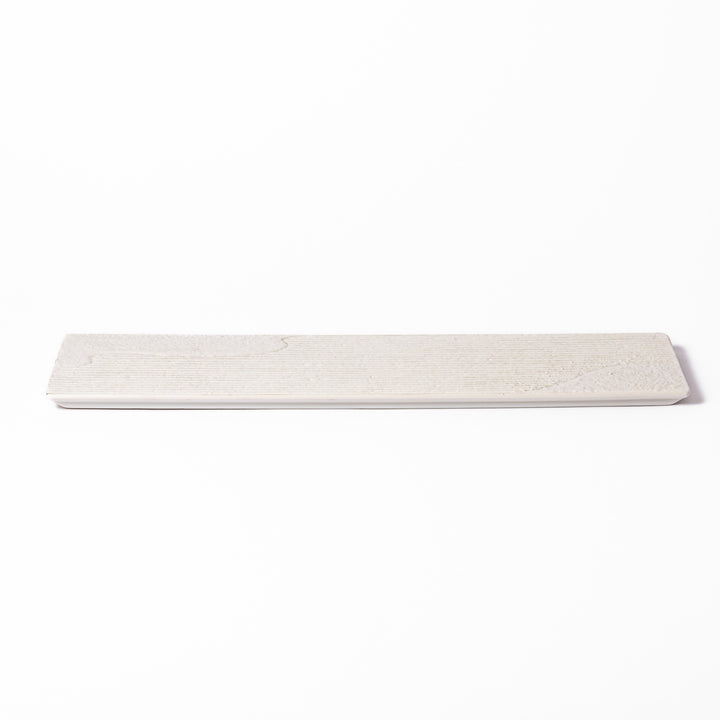 Rectangular white ceramic serving plate with fine ridged texture and soft matte-gloss contrast, ideal for modern Japanese table presentations.