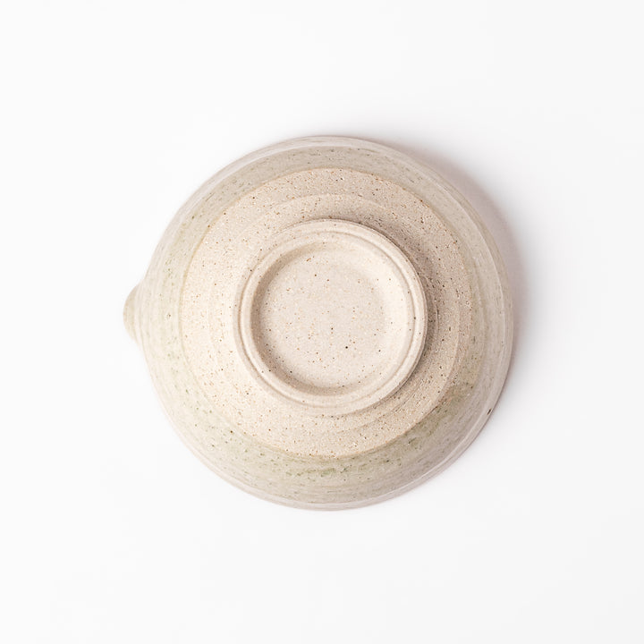 Soft sage-colored mortar with a speckled Hiwa glaze and grooved interior, perfect for grinding sesame or spices.