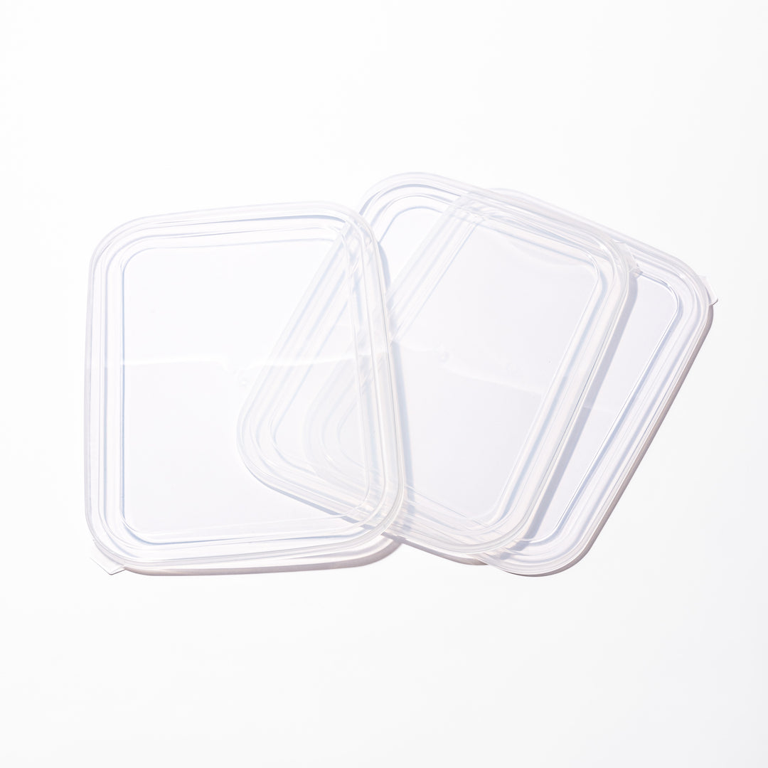 Transparent replacement lids for stainless steel prep trays with snug-fitting seal and durable construction for efficient food storage.