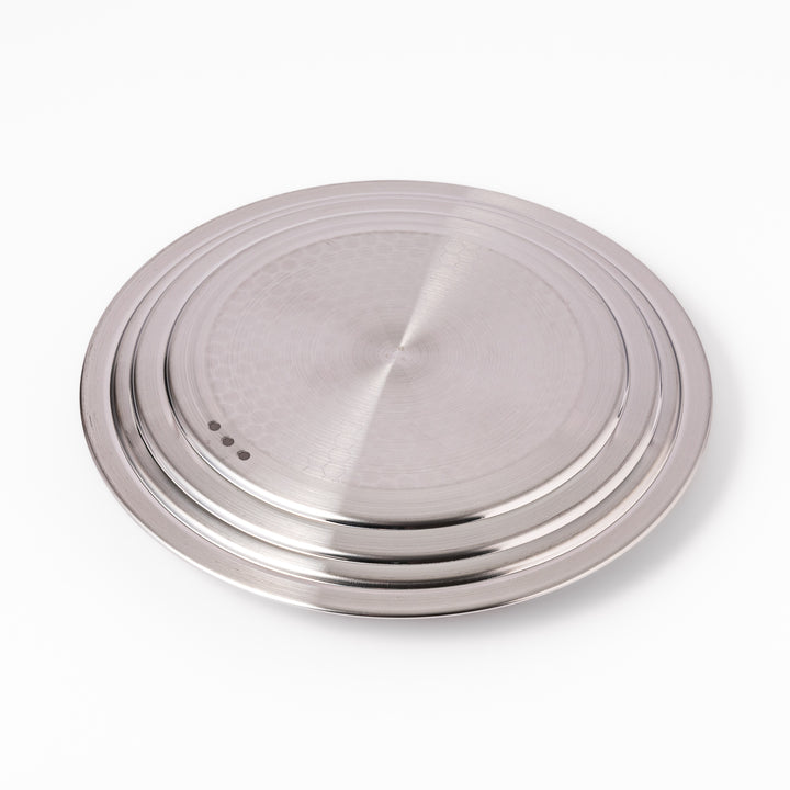 Stainless steel lid with a natural wooden knob designed for Yukihira pots, combining modern simplicity and traditional Japanese craftsmanship for everyday cooking use.