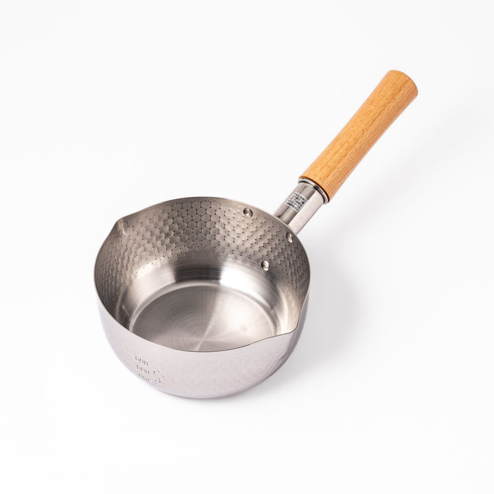Japanese stainless steel Yukihira pot with a wooden handle and hammered finish, featuring twin pour spouts for easy cooking, simmering, and sauce preparation.