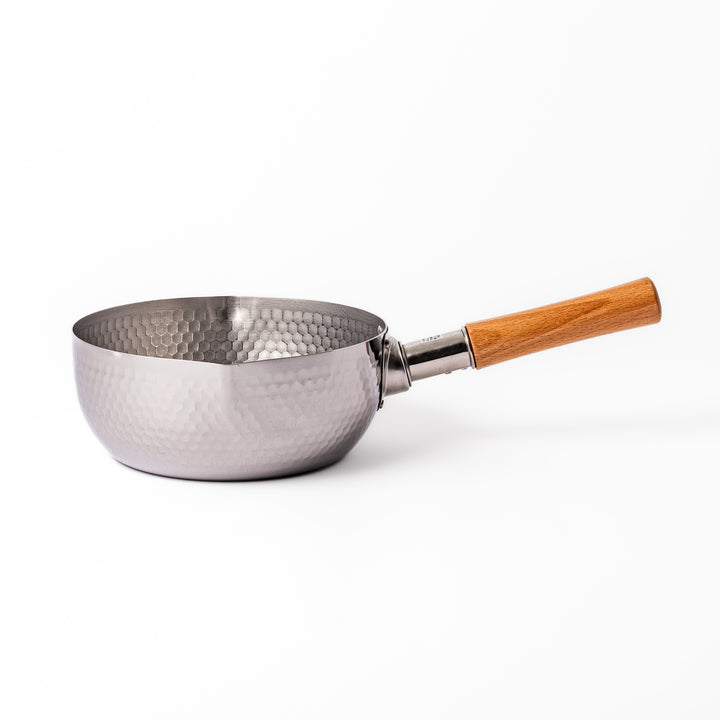 Japanese stainless steel Yukihira pot with a hammered finish and wooden handle, crafted for making soups, sauces, and simmered dishes with even heat distribution.