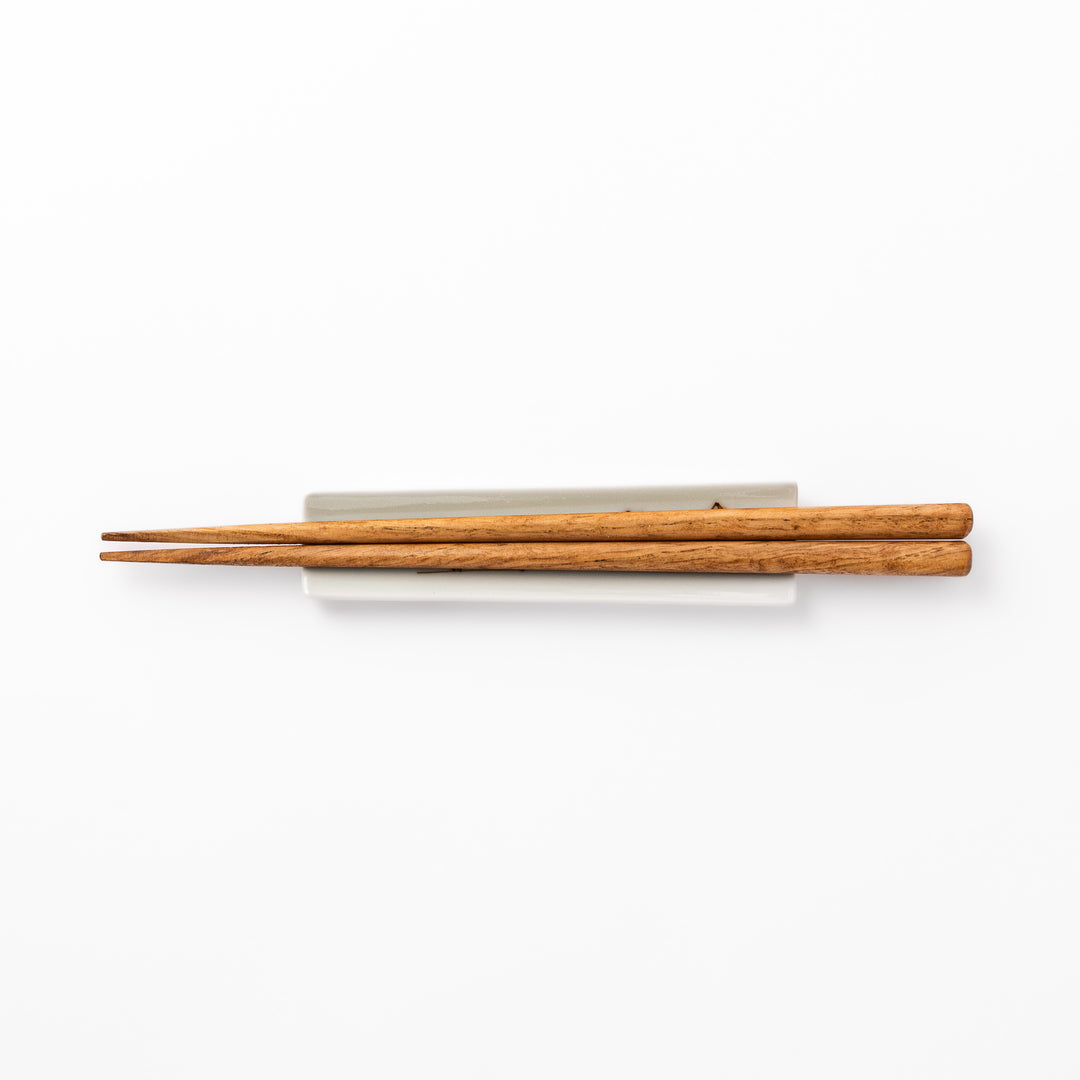 Japanese porcelain chopstick rest with whimsical Egypt design featuring pyramid, camel, cactus, and colorful palm trees