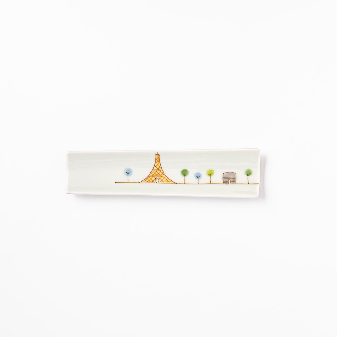 Japanese porcelain chopstick rest with whimsical France design featuring Eiffel Tower, Arc de Triomphe, and colorful trees