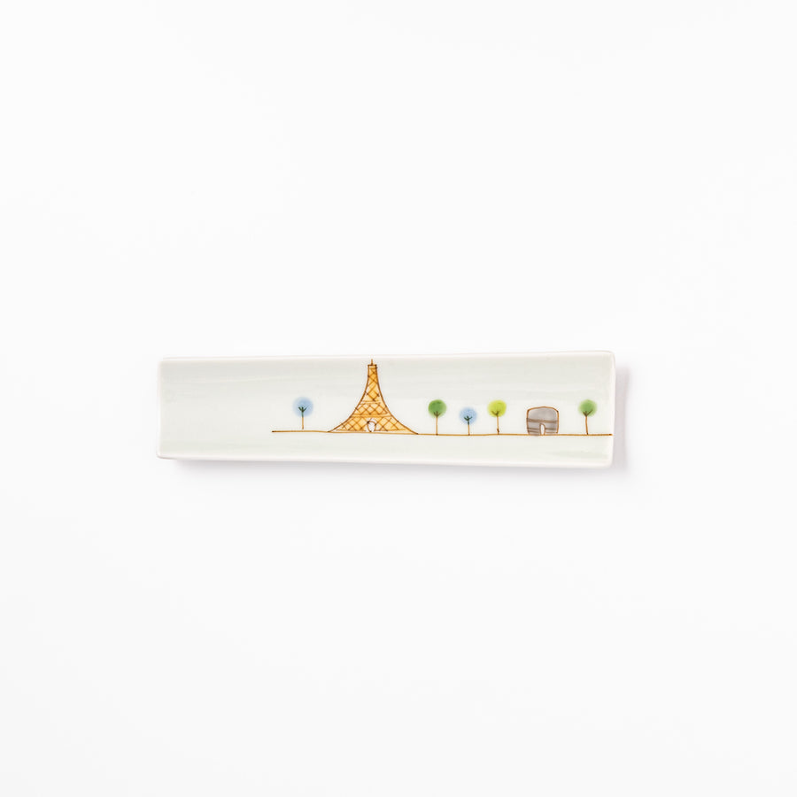 Japanese porcelain chopstick rest with whimsical France design featuring Eiffel Tower, Arc de Triomphe, and colorful trees