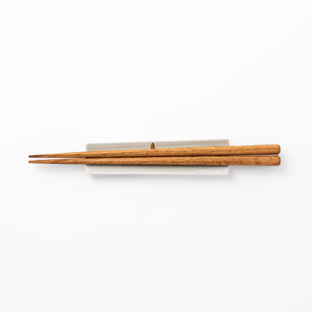 Japanese porcelain chopstick rest with whimsical France design featuring Eiffel Tower, Arc de Triomphe, and colorful trees