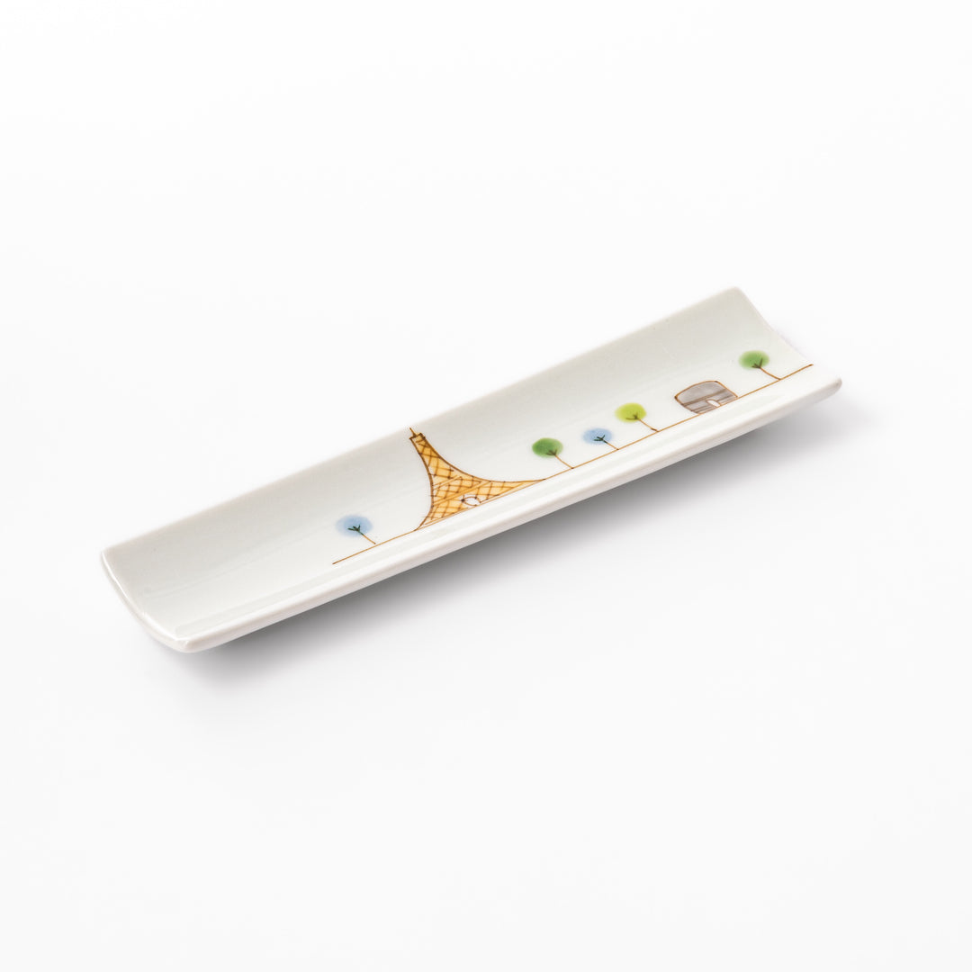 Japanese porcelain chopstick rest with whimsical France design featuring Eiffel Tower, Arc de Triomphe, and colorful trees