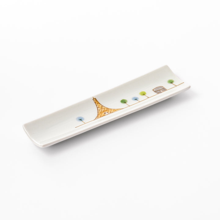 Japanese porcelain chopstick rest with whimsical France design featuring Eiffel Tower, Arc de Triomphe, and colorful trees