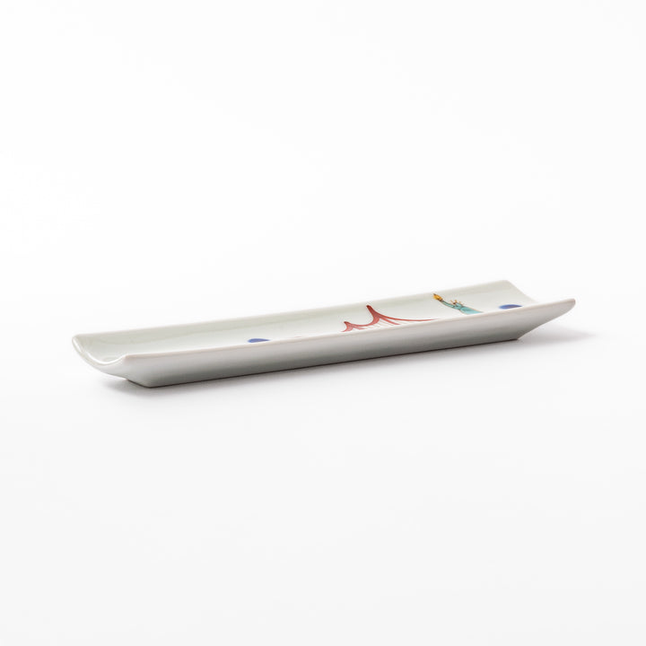 Japanese porcelain chopstick rest with USA design featuring Statue of Liberty, red bridge, and colorful cityscape accents