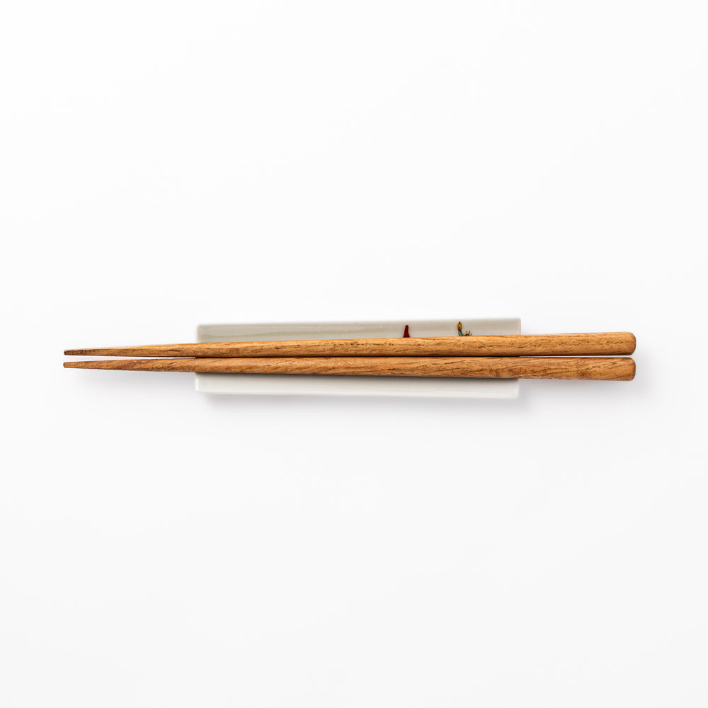 Japanese porcelain chopstick rest with USA design featuring Statue of Liberty, red bridge, and colorful cityscape accents