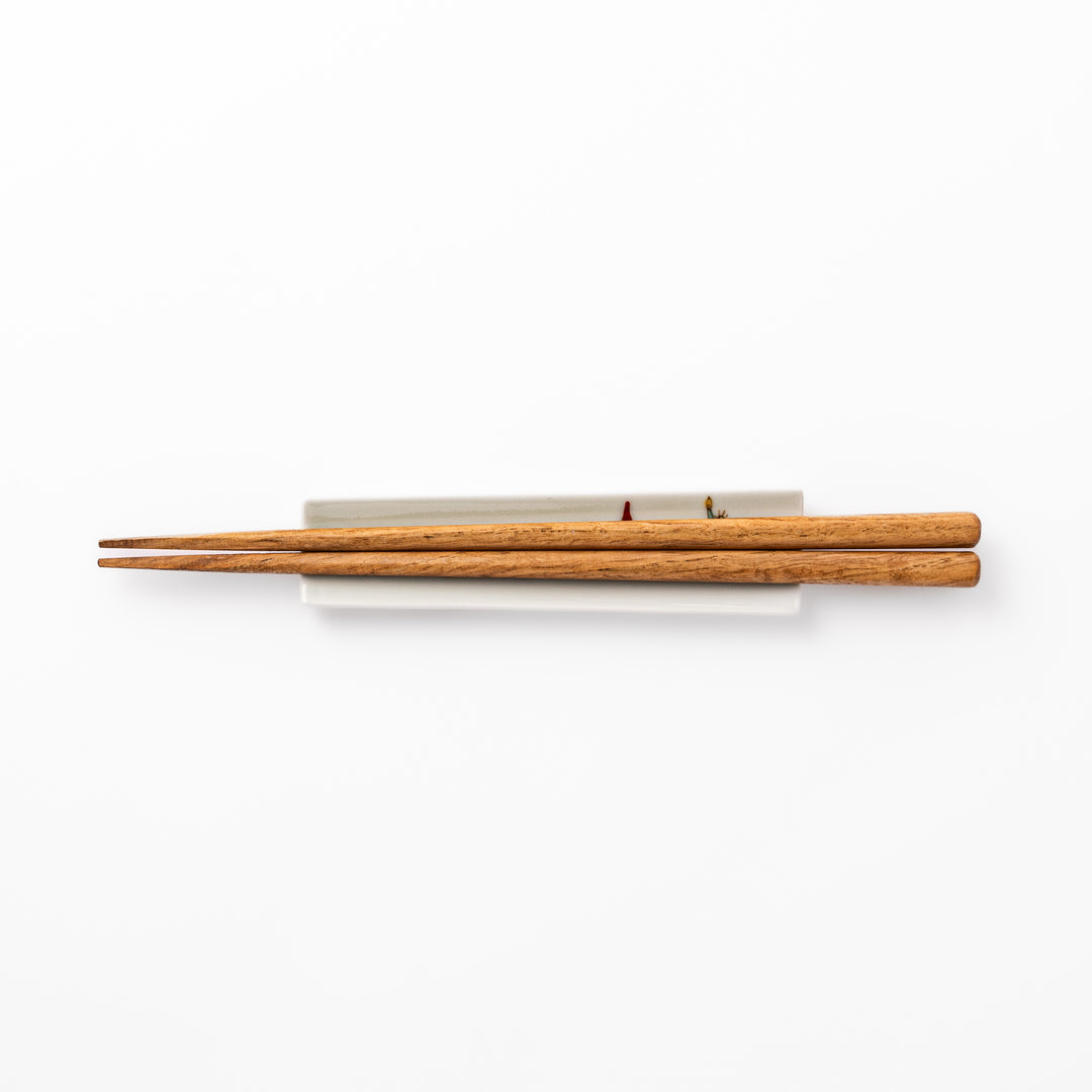 Japanese porcelain chopstick rest with USA design featuring Statue of Liberty, red bridge, and colorful cityscape accents