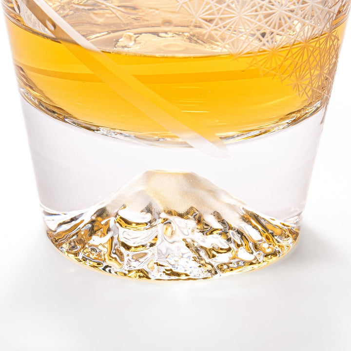 Clear rocks glass with etched starburst lattice pattern, swirling stripe detail, and textured 3D Mount Fuji base.
