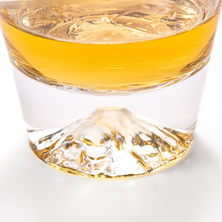 Clear rocks glass with etched geometric circles and dots, diagonal swirl accent, and detailed 3D Mount Fuji base.