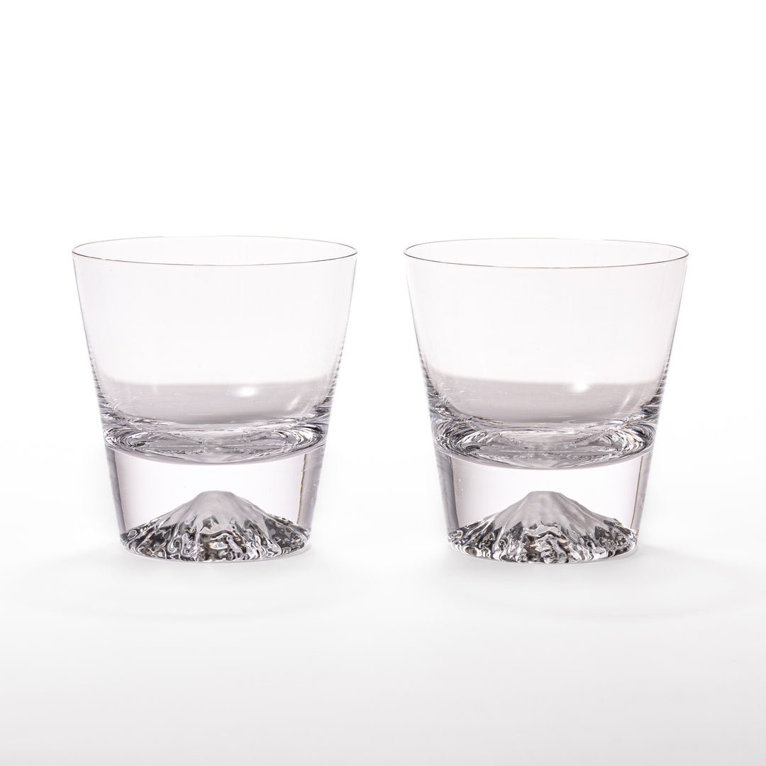 Two glasses placed inside a wooden box with the Edo Glass logo visible on the top of the box. The glasses feature a detailed design resembling Mount Fuji at the base.