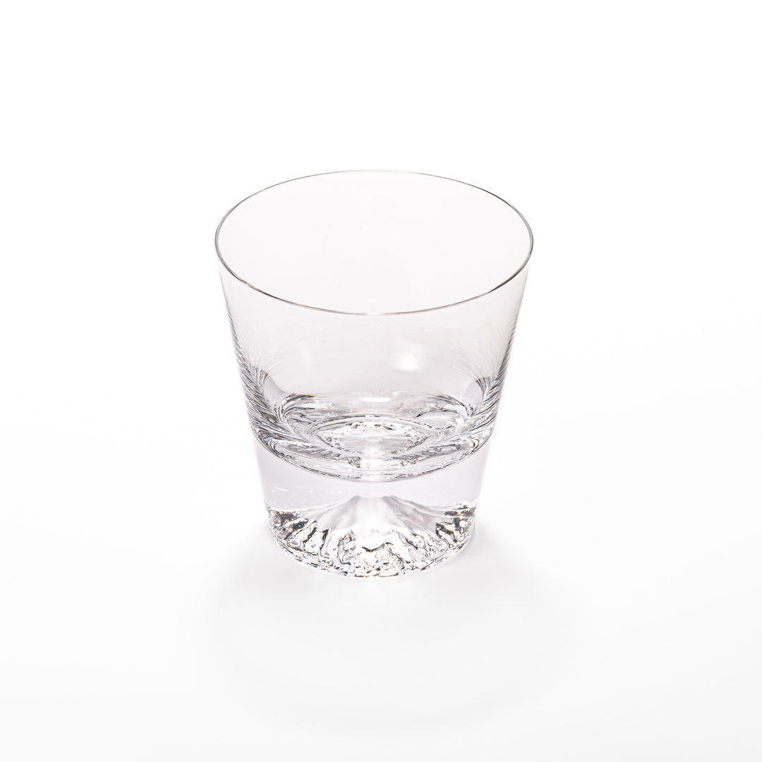 Two glasses placed inside a wooden box with the Edo Glass logo visible on the top of the box. The glasses feature a detailed design resembling Mount Fuji at the base.