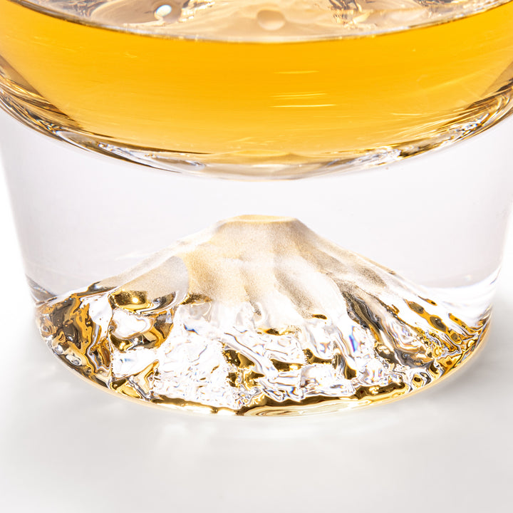 Two glasses placed inside a wooden box with the Edo Glass logo visible on the top of the box. The glasses feature a detailed design resembling Mount Fuji at the base.