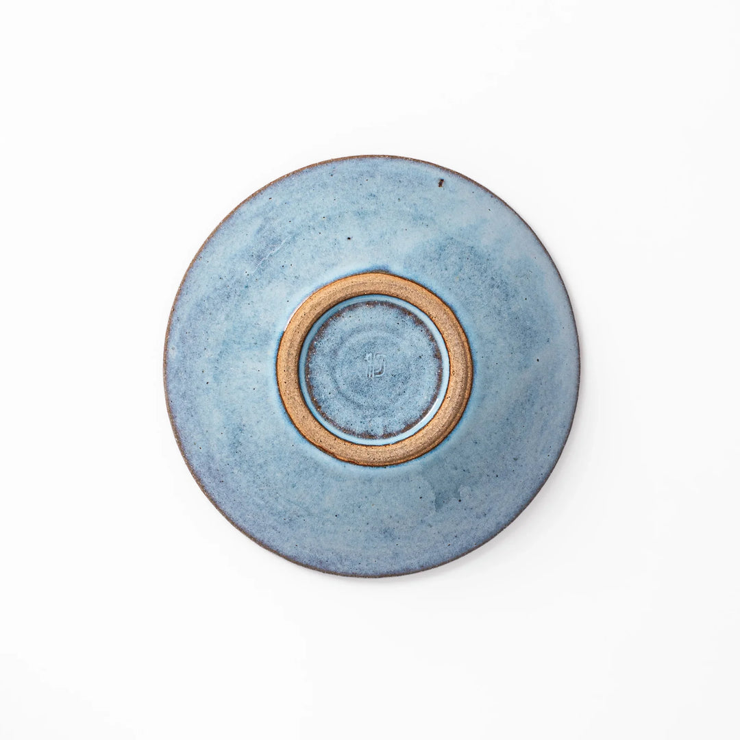 Terracotta blue ceramic cereal bowl with rustic brown rim, handcrafted in Japan for serving cereal, salad, soup, or everyday meals.