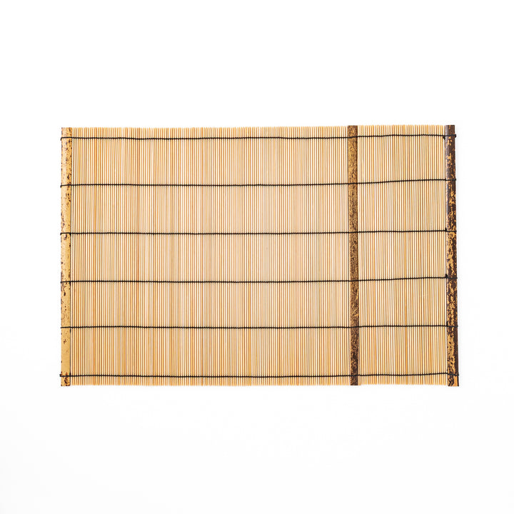 Japanese woven bamboo placemat in natural white tones with black thread accent for elegant dining table setup