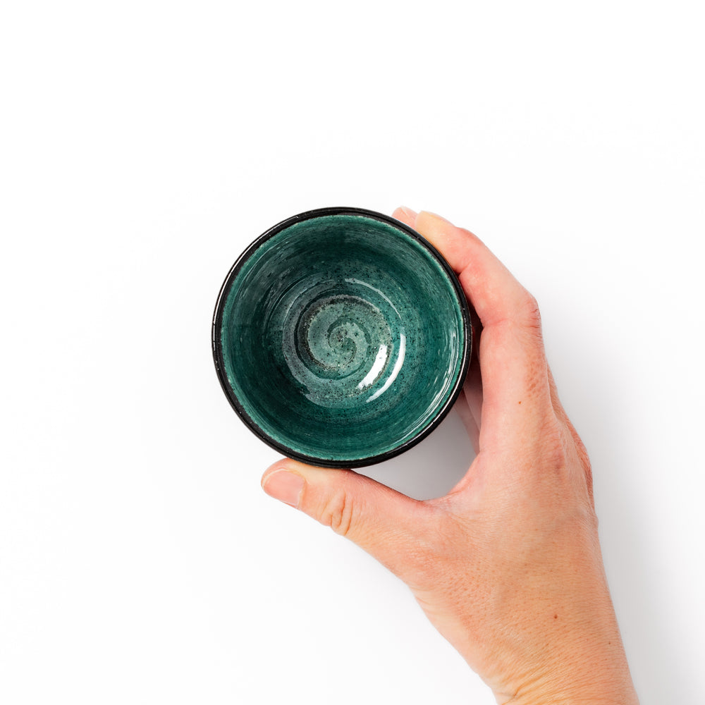 Turkish blue Japanese ceramic sake cup with rustic brown base and textured glaze, ideal for enjoying traditional sake