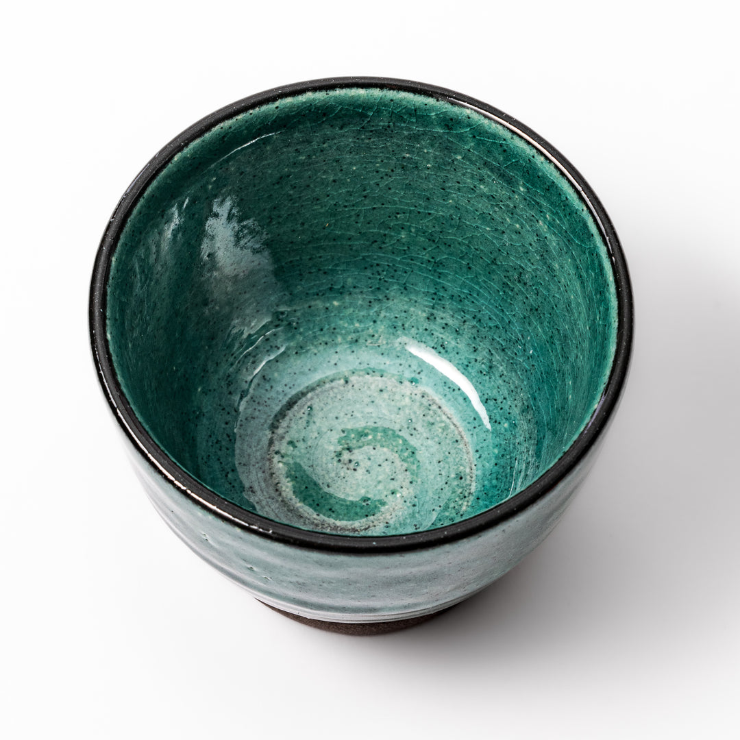 Turkish blue Japanese ceramic sake cup with rustic brown base and textured glaze, ideal for enjoying traditional sake