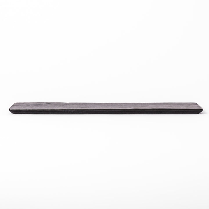 Rectangular black ceramic serving plate with a subtle ridged woodgrain texture, perfect for stylish Japanese meals and contemporary plating.