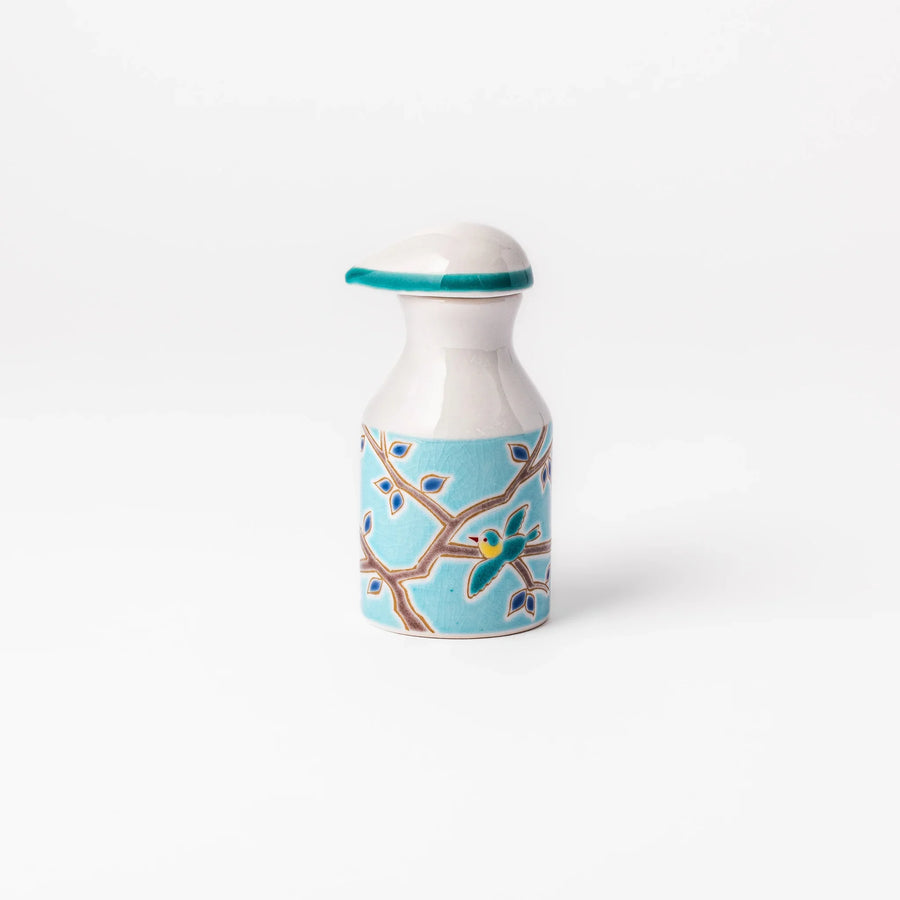 Japanese porcelain soy sauce dispenser with turquoise glaze and twin songbird motif on tree branches, handcrafted design.