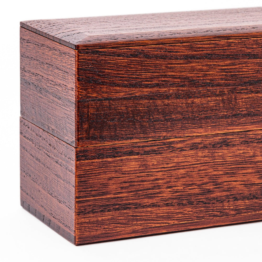 Rectangular two-tier bento box crafted from dark brown paulownia wood, showcasing a sleek grain pattern and a seamless, minimalist design.