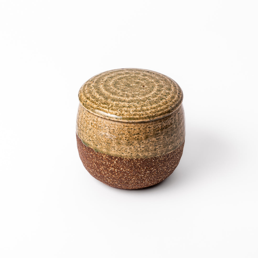 Two-tone Japanese ceramic rice storage bowl with lid, featuring smooth glazed top and textured brown lower half for rustic charm.