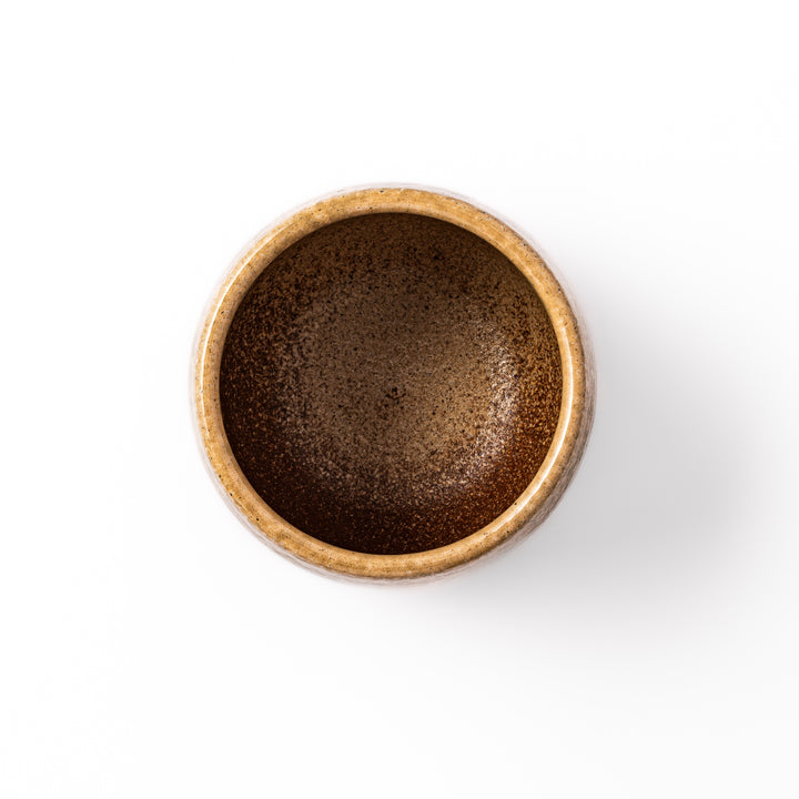 Two-tone Japanese ceramic rice storage bowl with lid, featuring smooth glazed top and textured brown lower half for rustic charm.